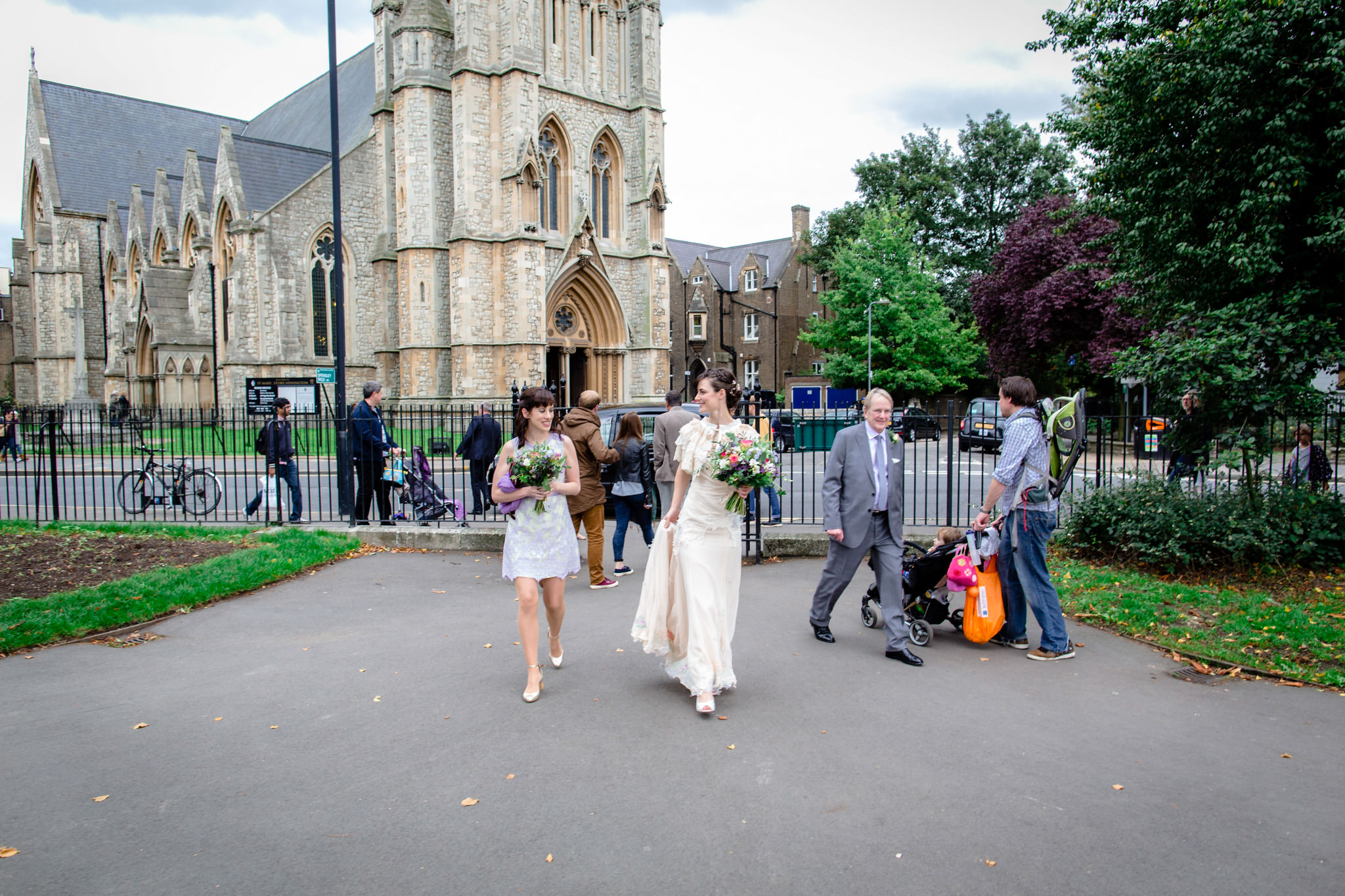 Clissold House wedding bride walks in front of the car