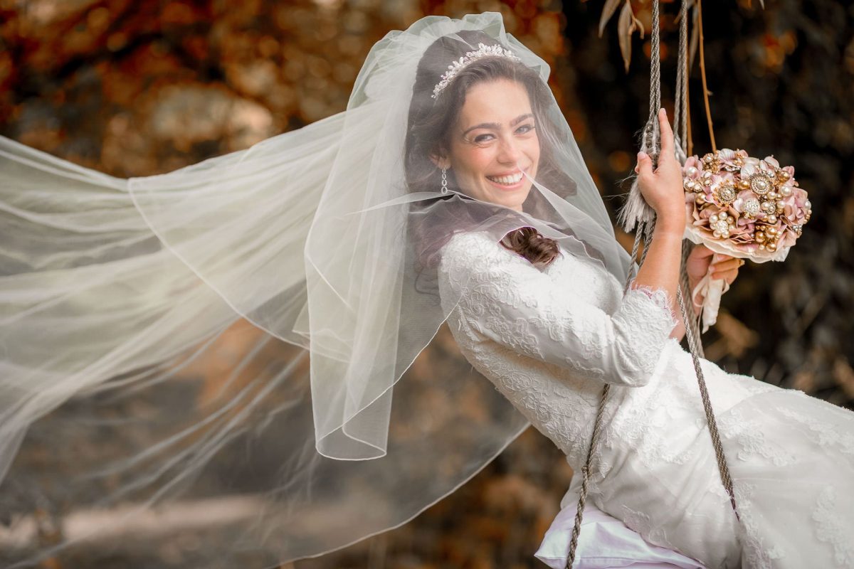 Jewish Wedding Photography bride on the swing