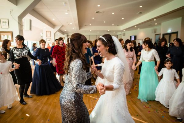 Jewish Wedding Photo bride dancing with friends