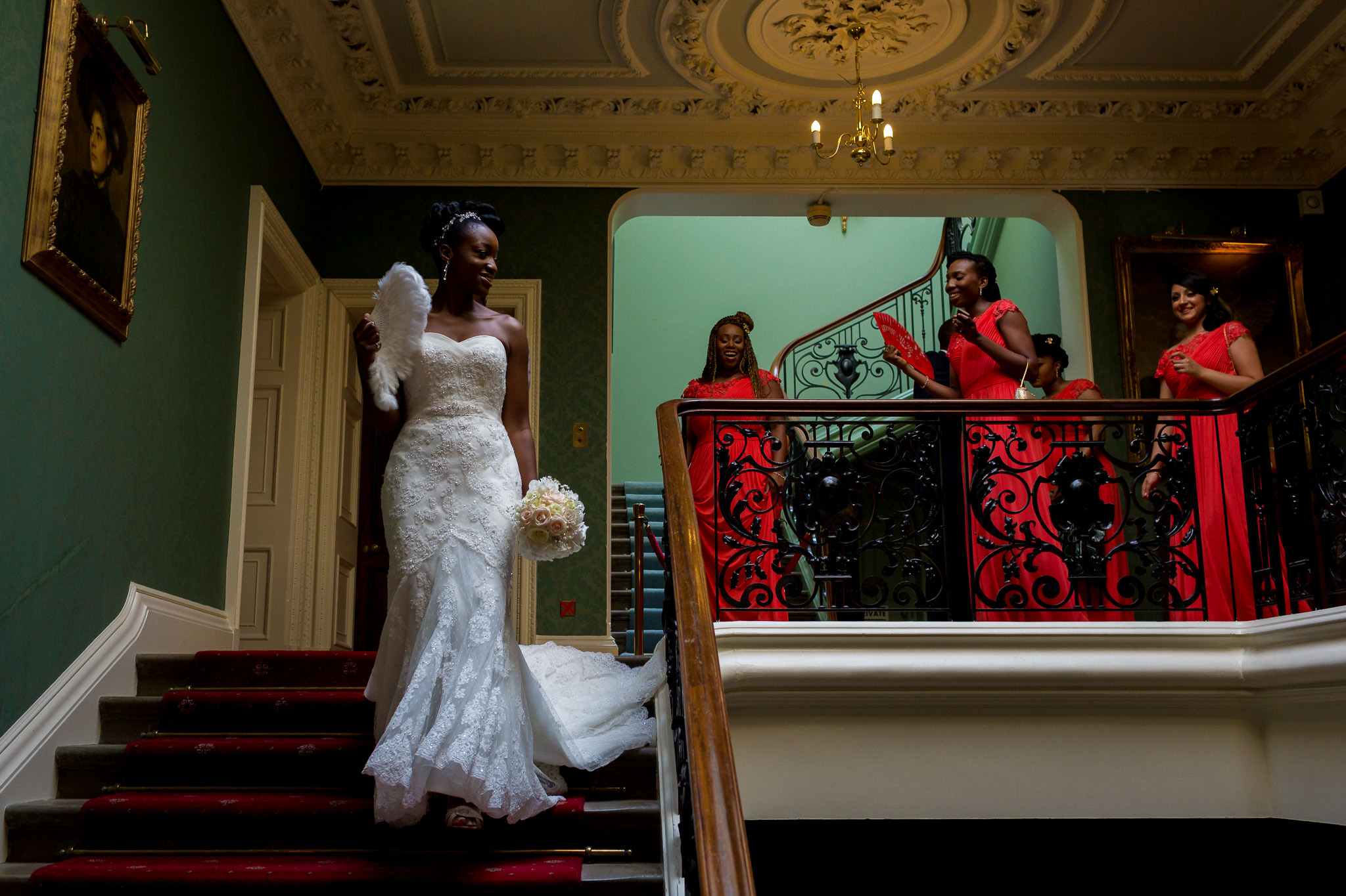 Addington Palace wedding bride walking down the stairs