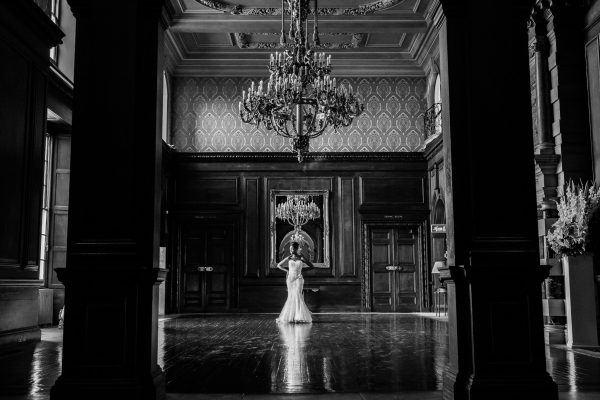 Addington Palace wedding bride posing in the venue hall