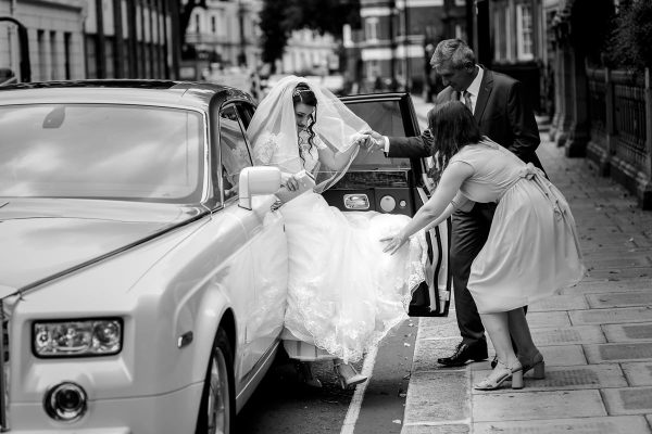 Greek Wedding Photo of bride getting out of the car