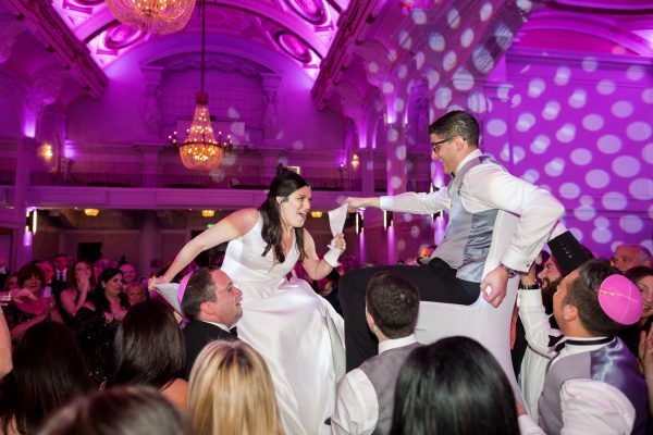 jewish wedding photographer chair dance during hora