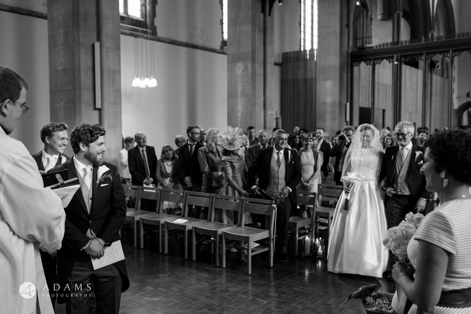 groom and the bride have their first look iat st mary of eton church hackney wick