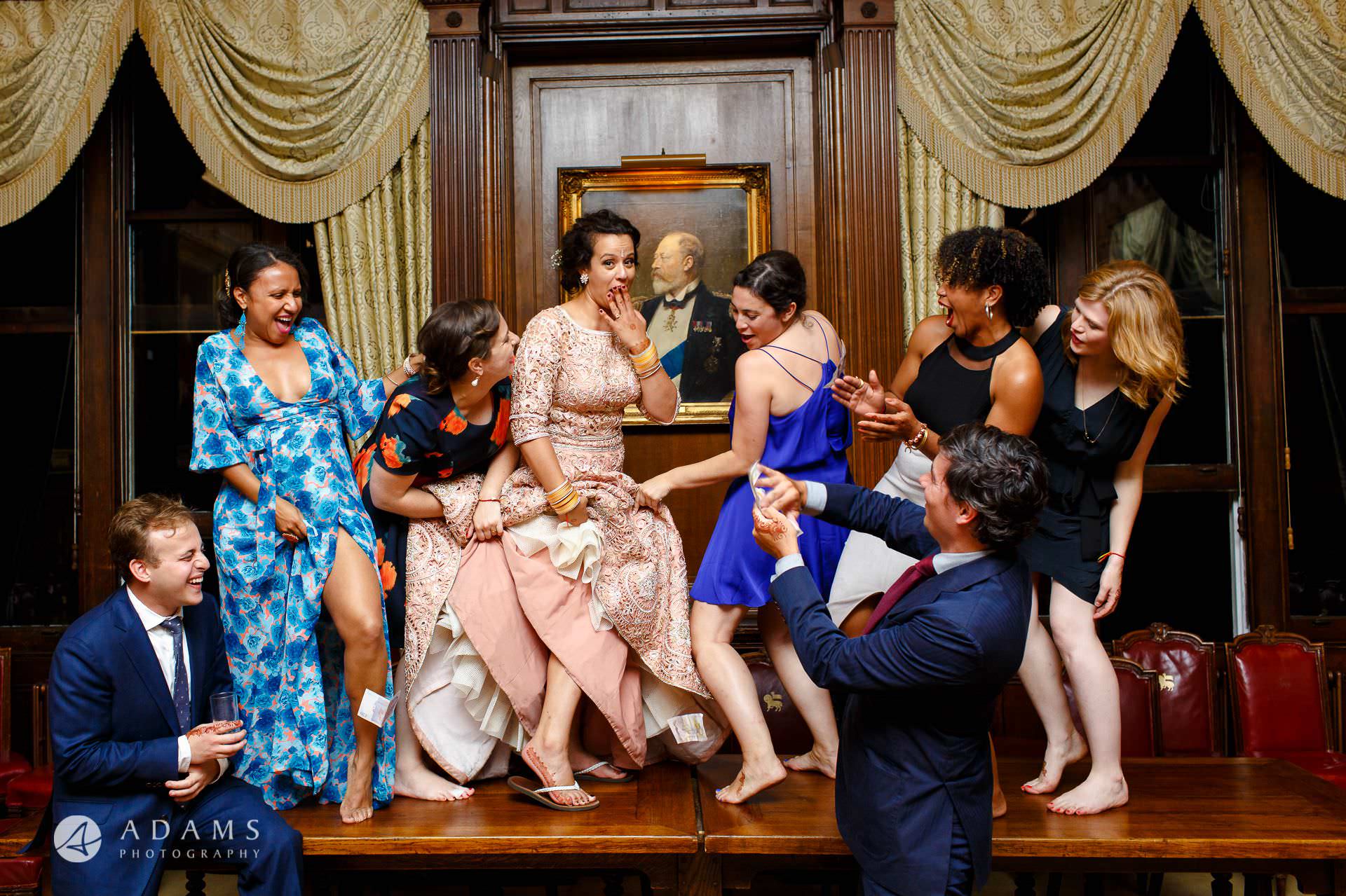 middle temple hall wedding photography bridal party dancing on the table