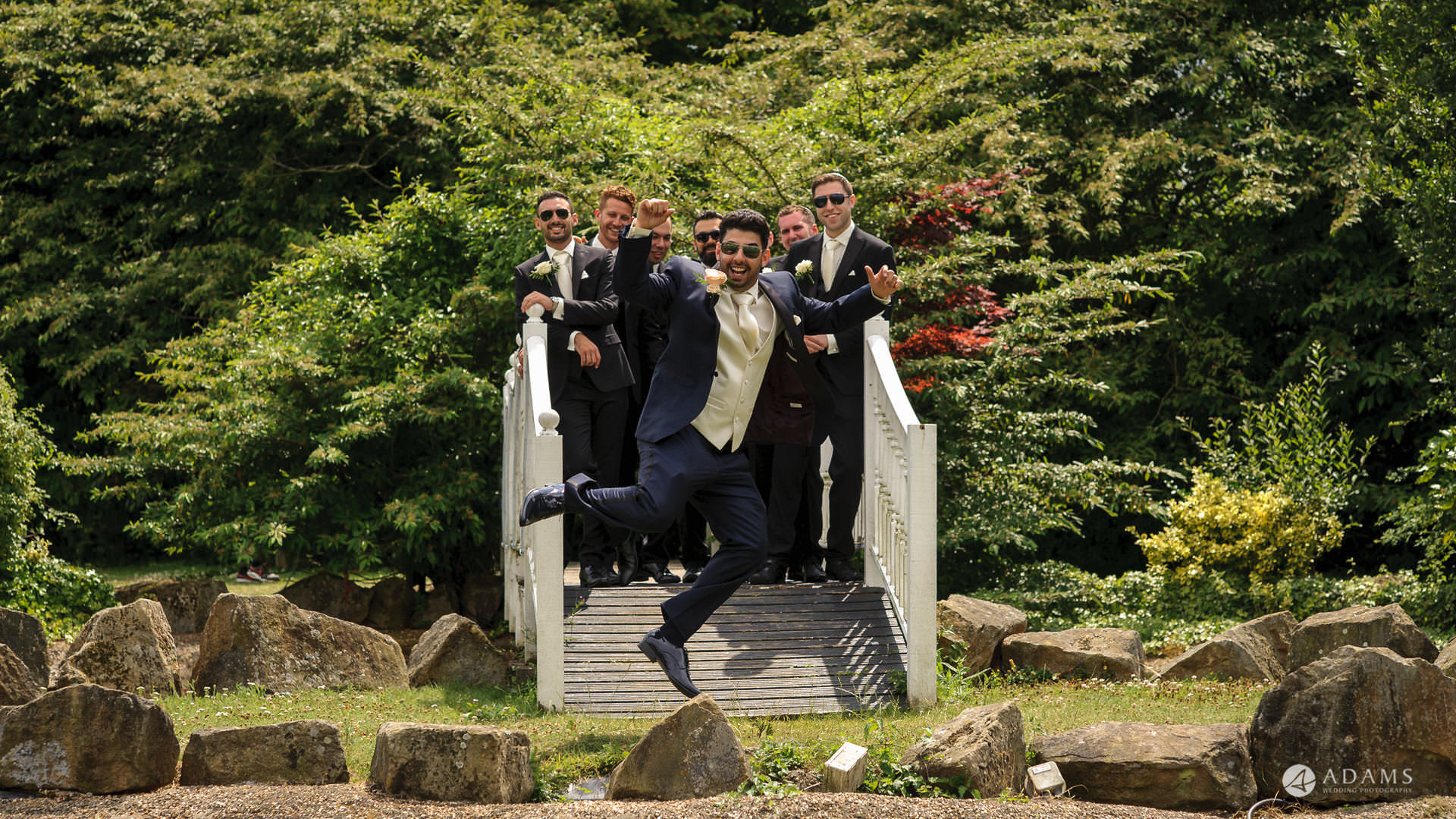 Manor of Groves Wedding groom flying in the aire