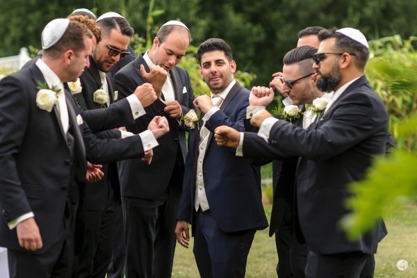 Manor of Groves Wedding guys showing their watches