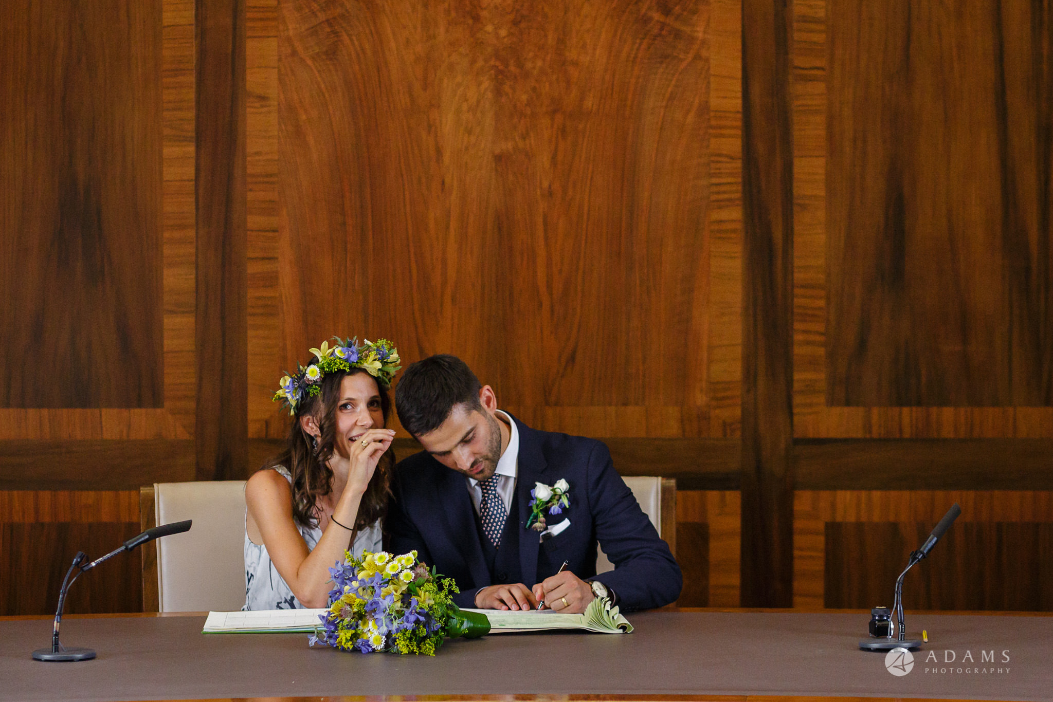 Clissold house wedding groom signing the registrar