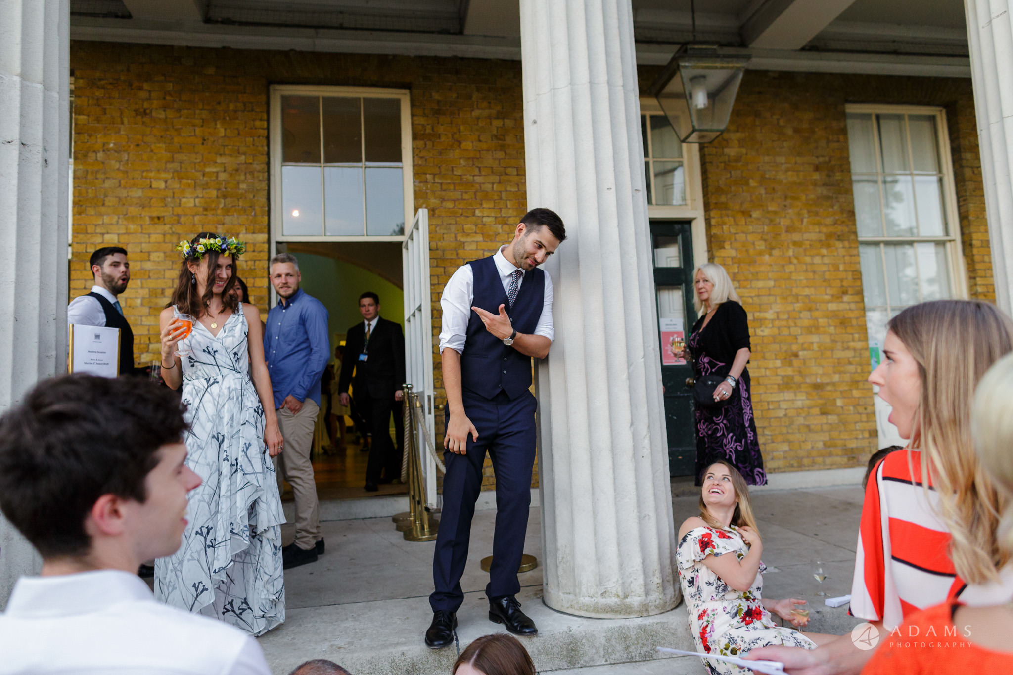 Clissold house wedding groom invites the guests inside