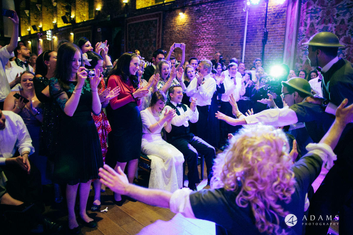 hatfield house wedding photography groom bride and guest reaction to the performance