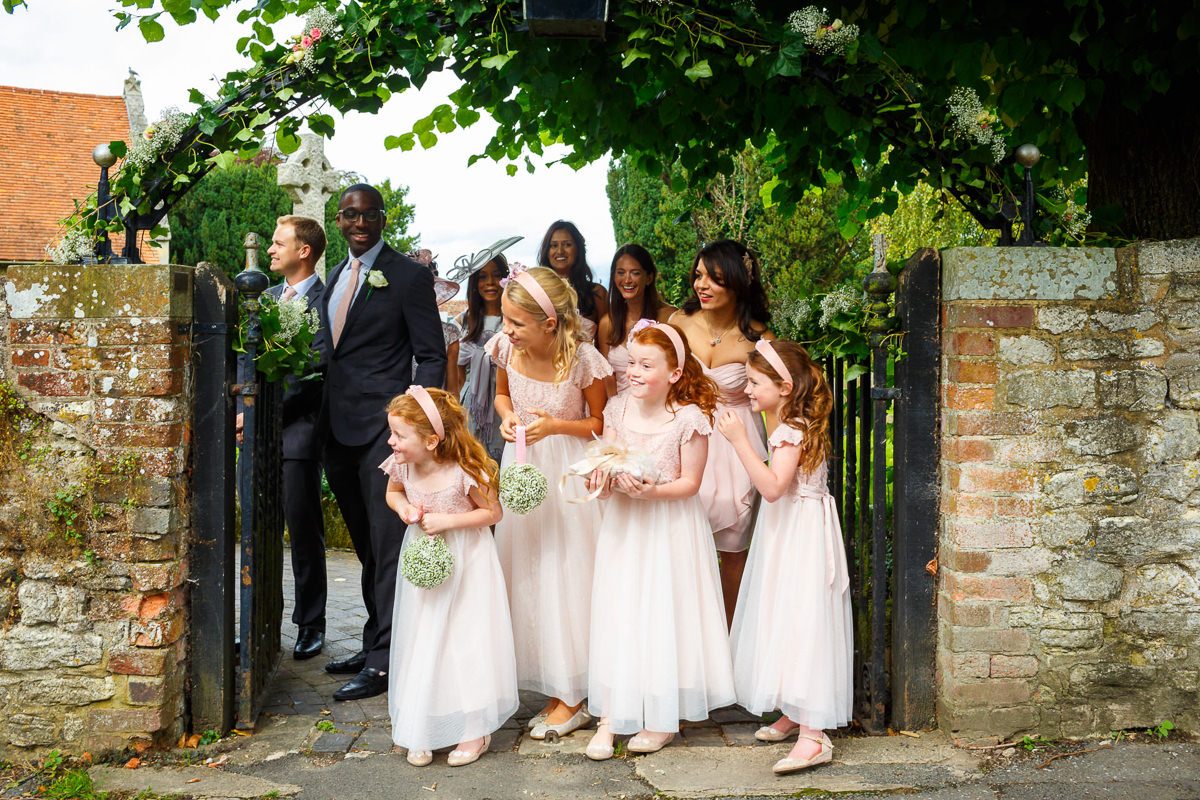 Best wedding photographer London flower-girls waiting for the bride to arrive