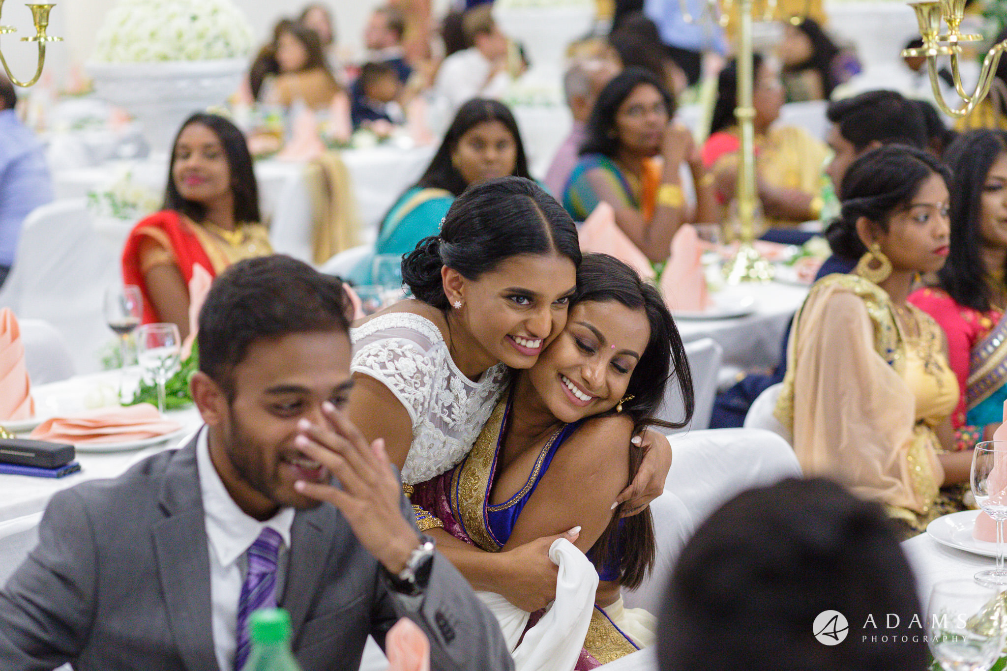 Norway Tamil Wedding bride hugs the guest