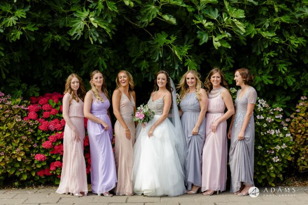 st donats castle wedding bride and her bridesmaids are having a group shot