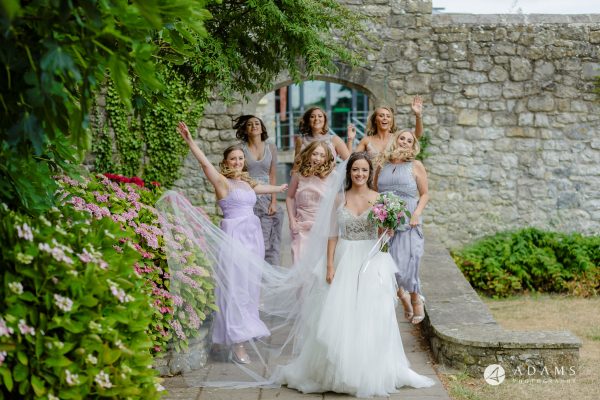 st donats castle wedding bridesmaids jumping