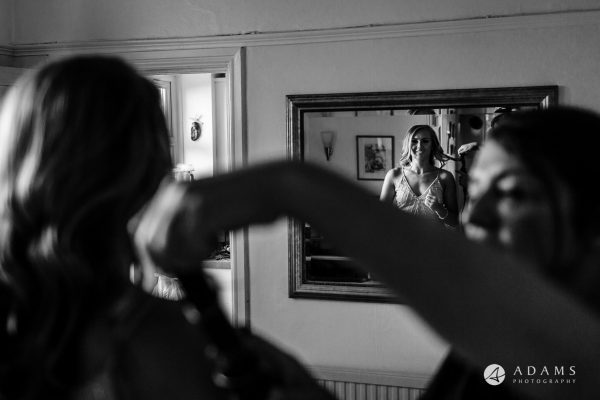 st donats castle wedding bridesmaid looking in the mirror