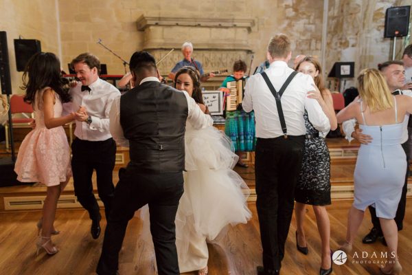 st donats castle wedding couple is dancing with guests