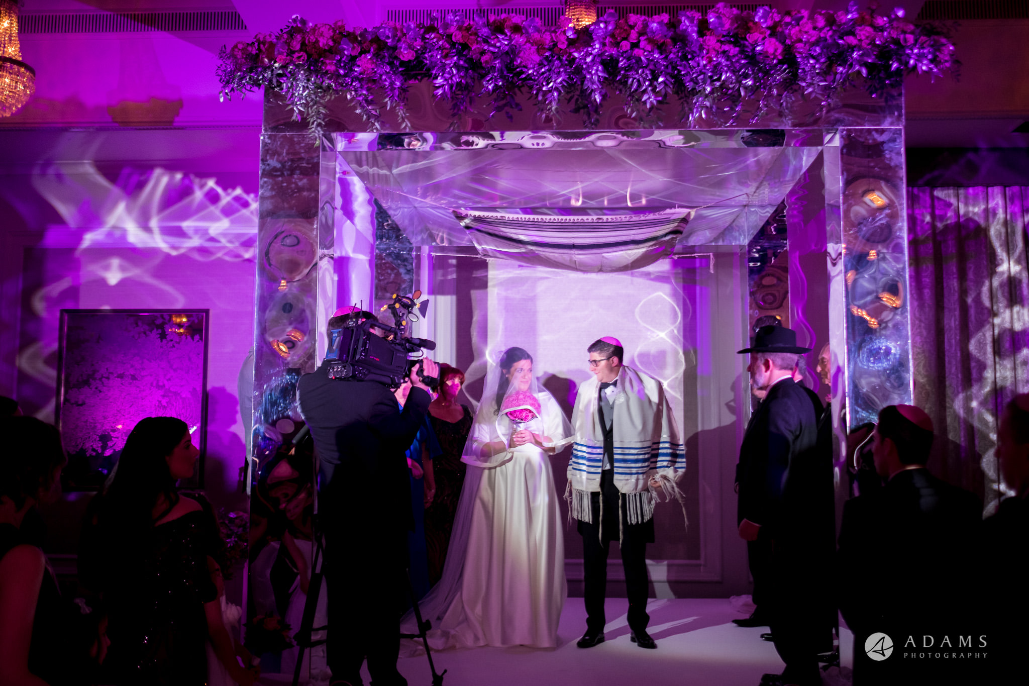 grand connaught rooms wedding bride and groom under Jewish chuppah