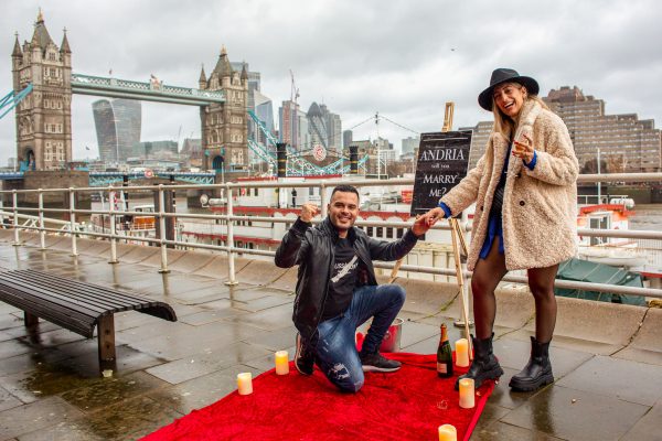 Happy Couple after the successful surprise proposal in front of the Tower Bridge in London