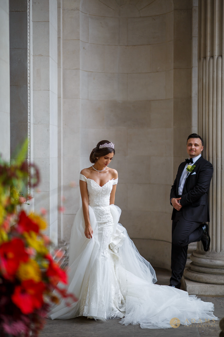 Old-Marylebone Town Hall Wedding Photographer couple posing outside the registry office