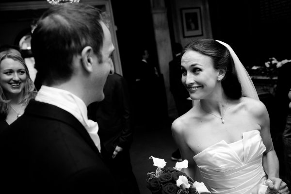 bride looks at the groom