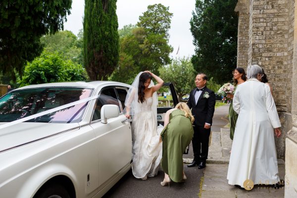 bride getting of the car