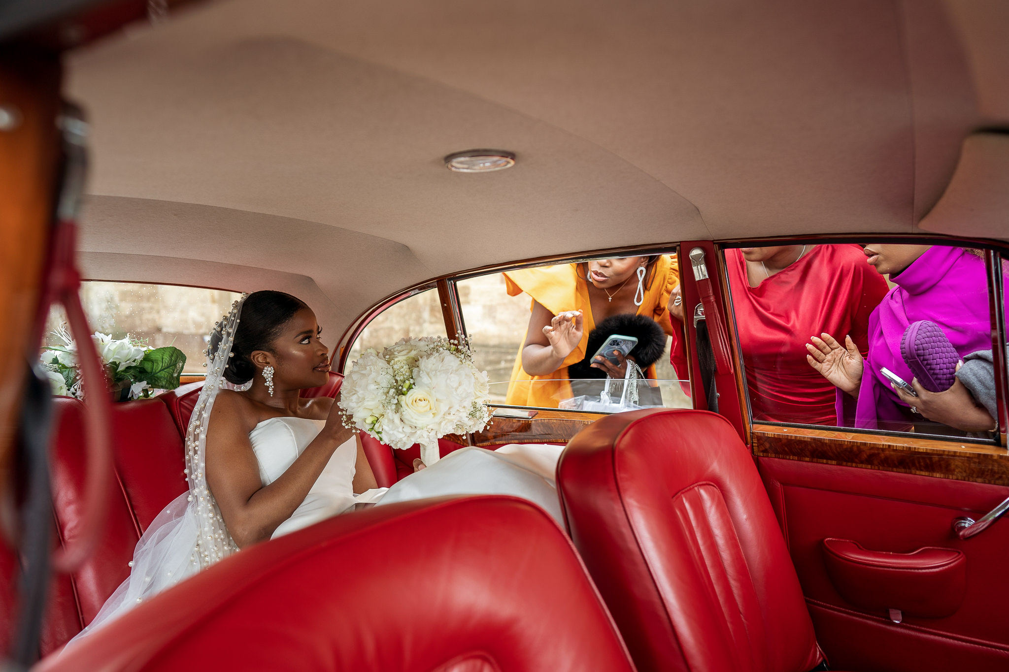 Bride in the wedding car
