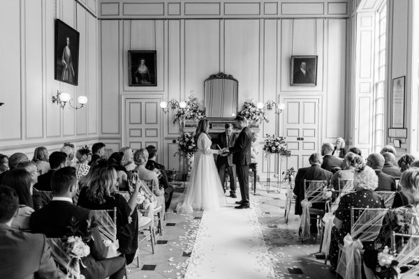 View of the room with the couple holding hands