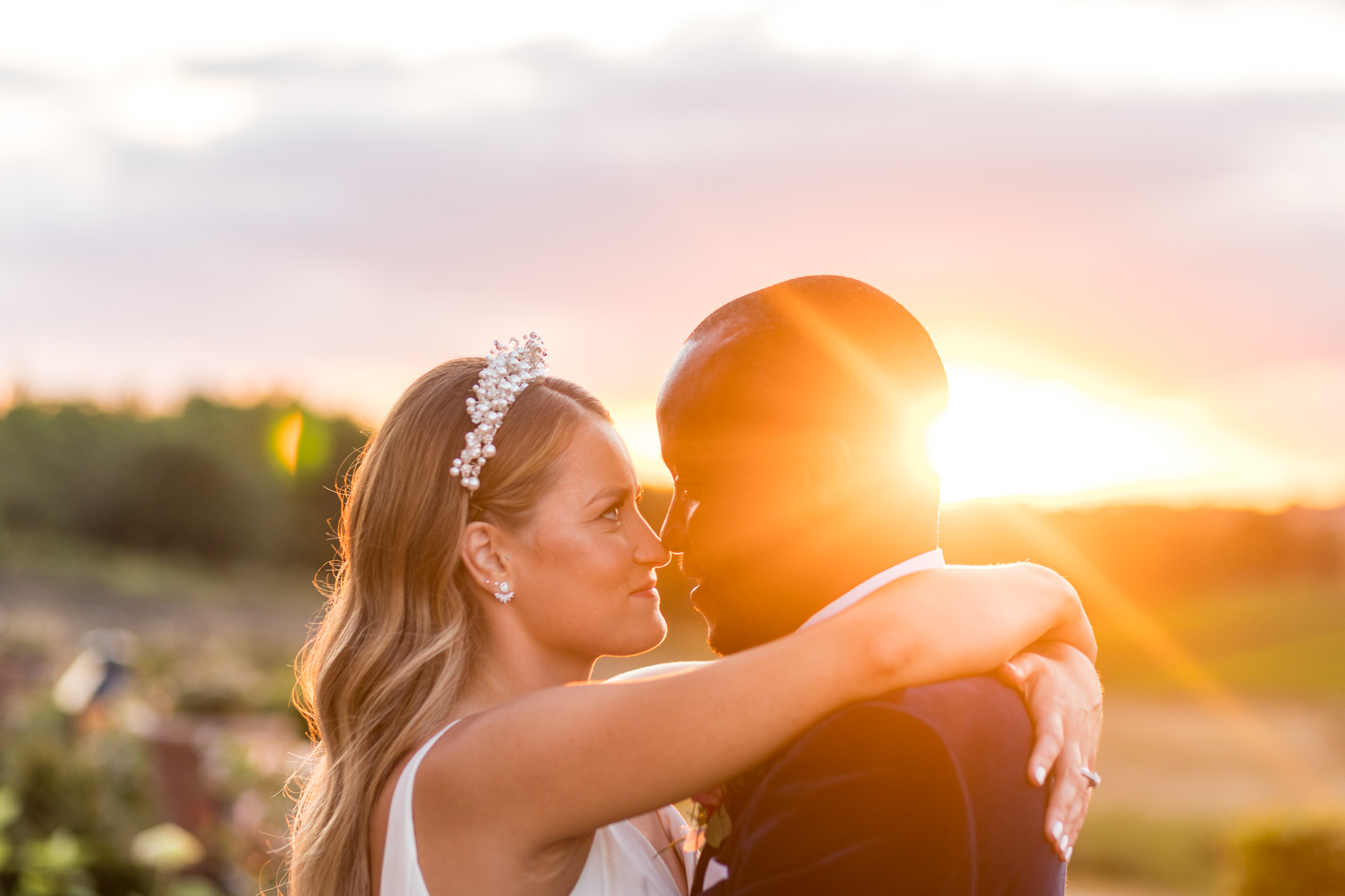 Golden hour portrait of the bride and groom at Old Hall Ely