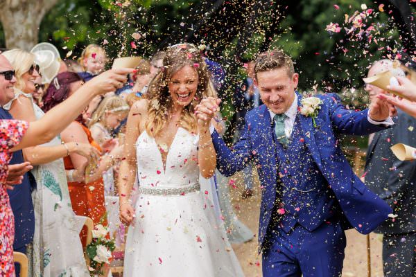 Married couple under the Confetti shower