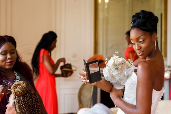 Berkshire Wedding Photographer bride looking into a mirror