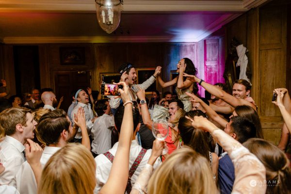 wild party and dancing at wedding in Cambridge