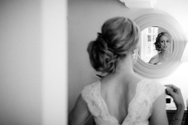 Suffolk Wedding Photographer bride looking in the mirror