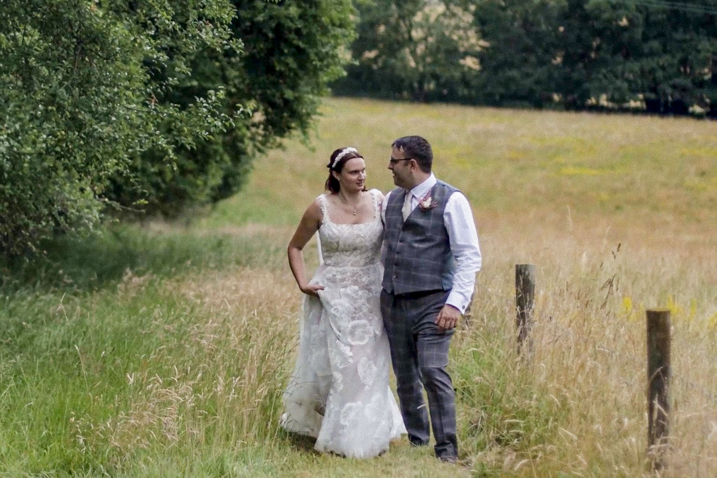 Combe Manor Barns Wedding Videographer Couple Walking