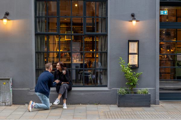 Proposal Photos in from of the caffe in London