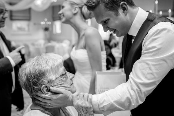 Groom is emotionally speaking with his grandmother