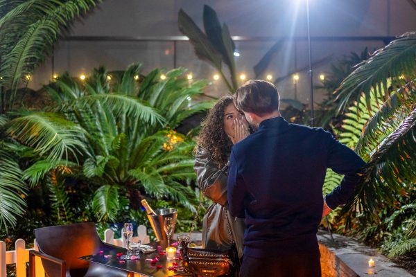 Happy Couple looking at each other after the marriage proposal at Sky Garden in London