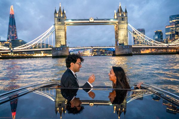 Boat proposal on the river Thames with Tower Bridge in the background