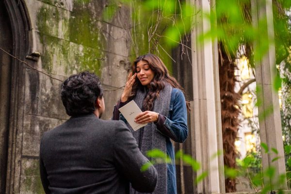 Future Bride has tears in her eyes during the proposal at St Dunstan in the East Church