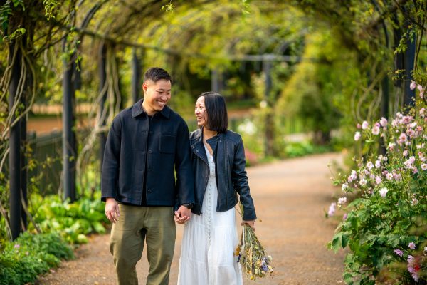 Couple walking in Rose garden